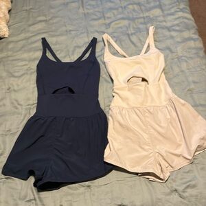2 Free people rompers - 1 navy 1 cream size small